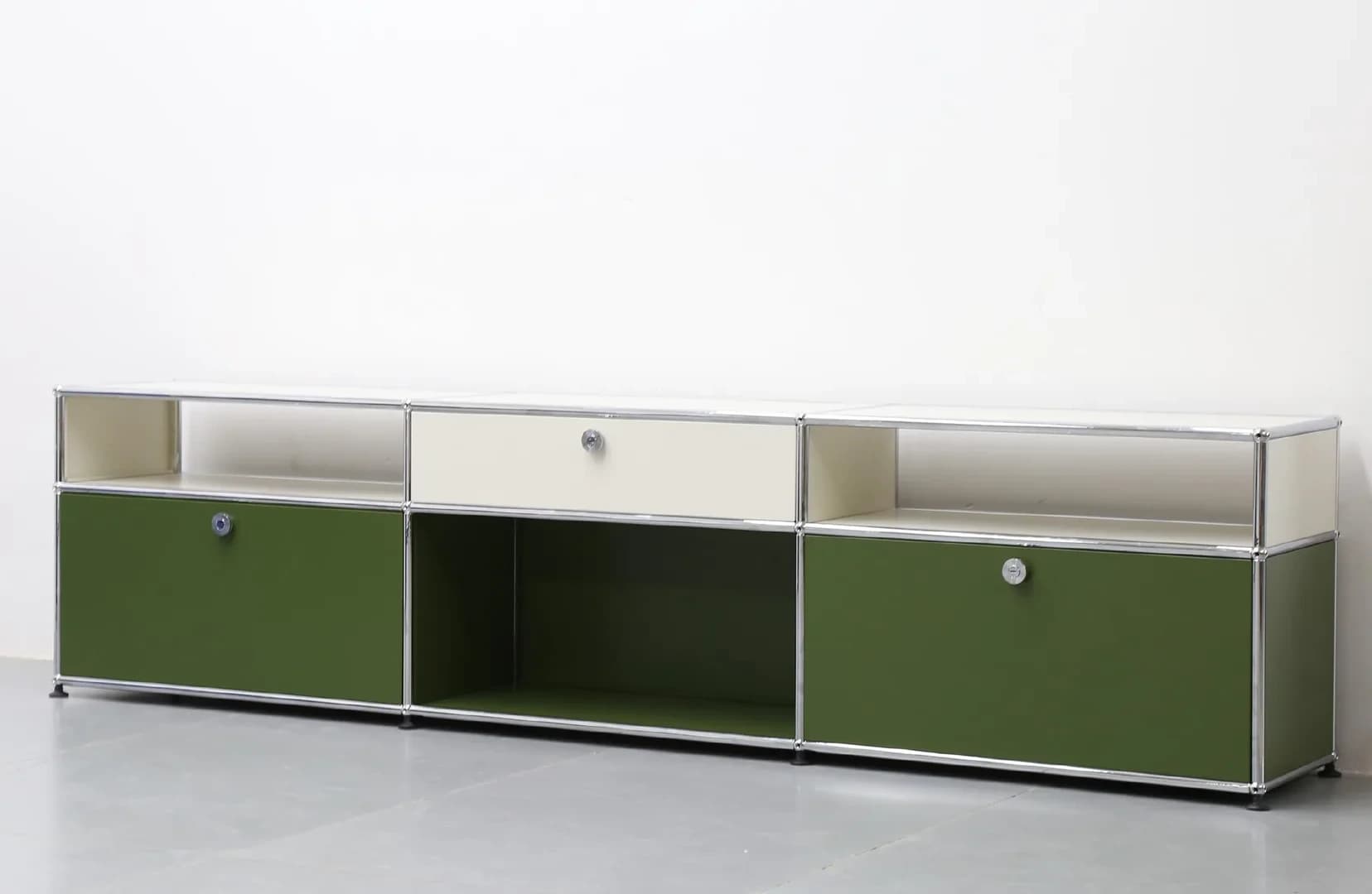 Olive-and-white media console — three bays