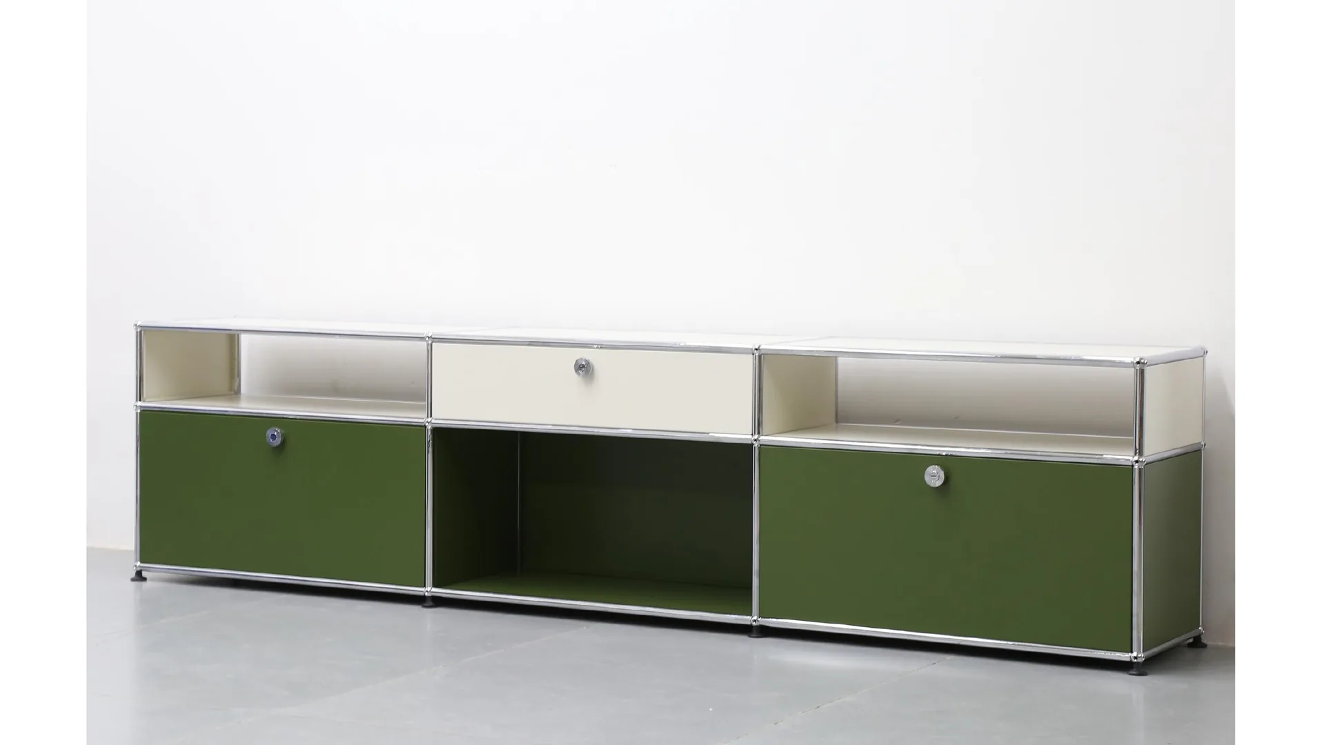 Olive-and-white media console — three bays